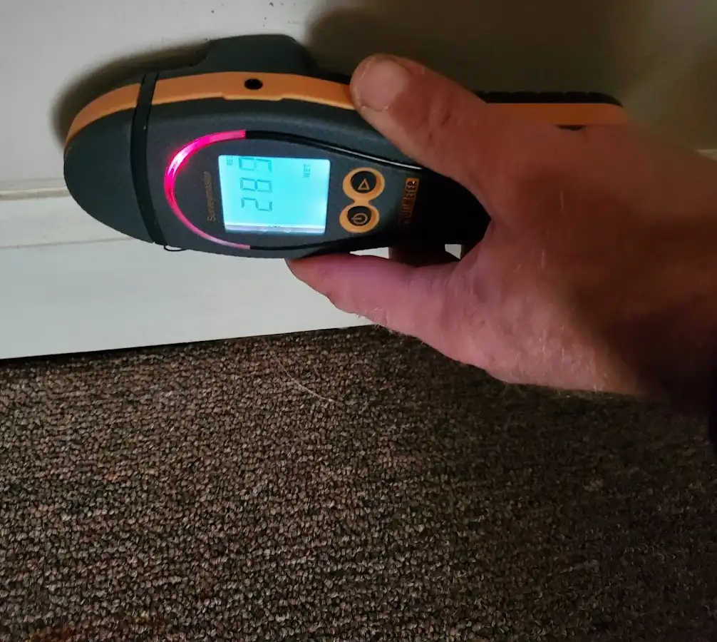 Moisture detection at baseboard during Burst Pipe Cleanup in Fort Carson